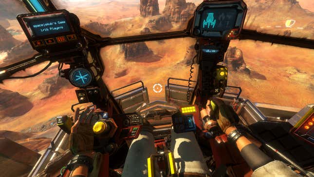 A first-person view from inside a mech cockpit shows the pilot's body and several controls used in Vox Machinae.