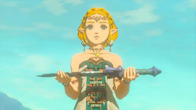 Zelda holds the master sword.